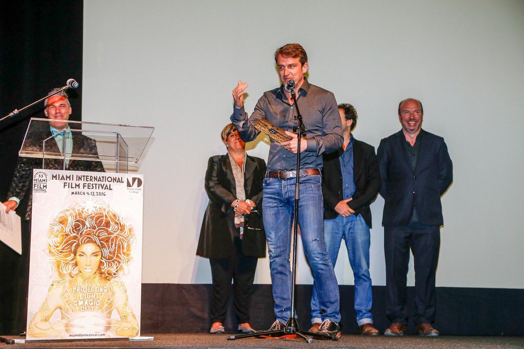 Lorenzo Vigas receiving Jordan Ressler Screenwriting Award at 33rd Miami Film Festival
